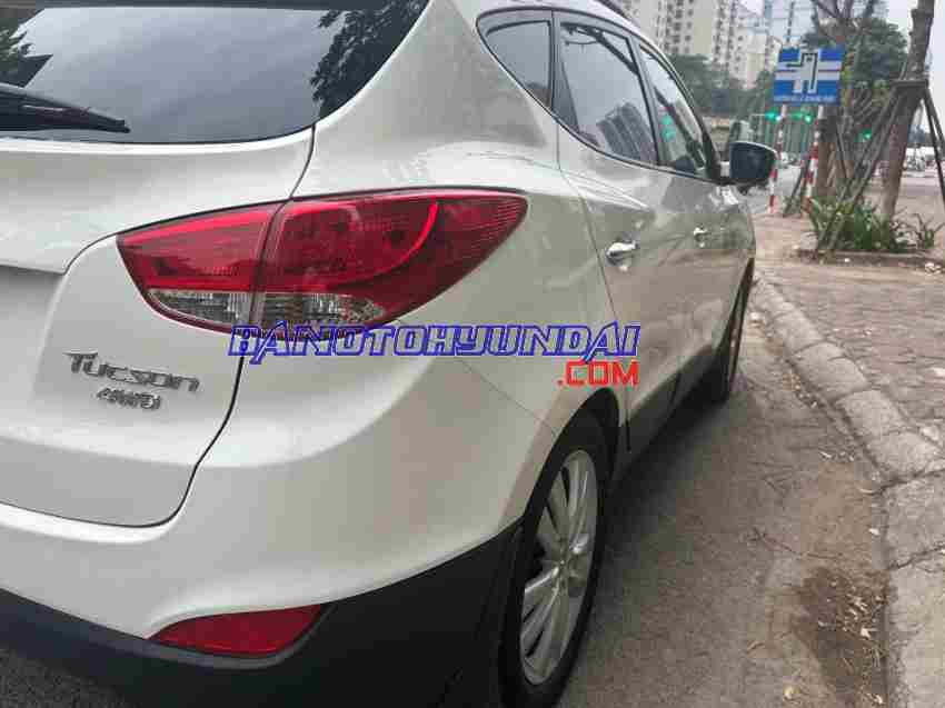 Cần bán xe Hyundai Tucson 2.0 AT 4WD 2011 Số tự động màu Trắng