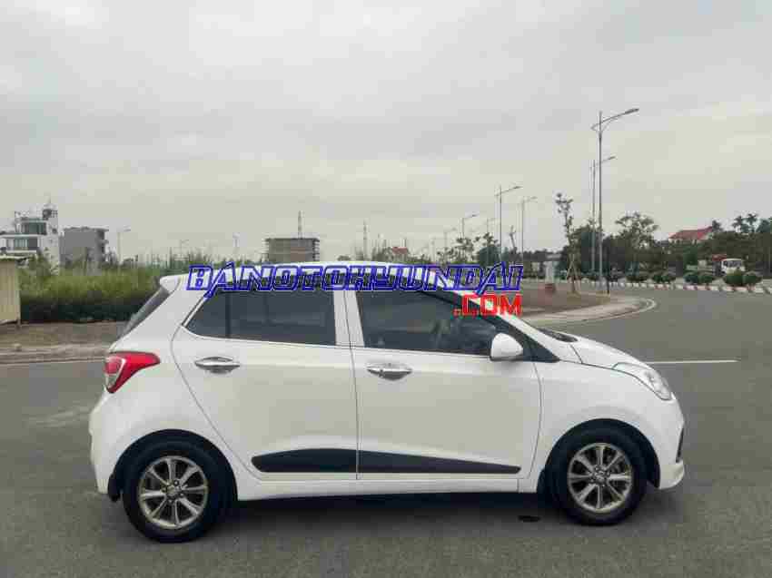 Cần bán xe Hyundai i10 Grand 1.0 AT màu Trắng 2015