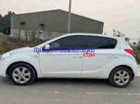 Cần bán gấp xe Hyundai i20 1.4 AT 2013 màu Trắng