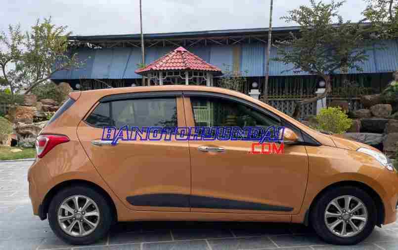 Cần bán xe Hyundai i10 Grand 1.2 AT năm 2015 màu Cam cực đẹp