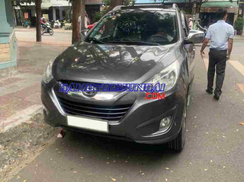 Cần bán gấp xe Hyundai Tucson 2.0 AT 4WD 2010 màu Xám