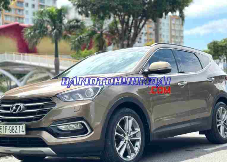 Cần bán gấp Hyundai SantaFe 2.4L 4WD đời 2016, màu Vàng