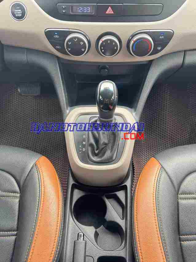 Cần bán xe Hyundai i10 Grand 1.0 AT màu Trắng 2015
